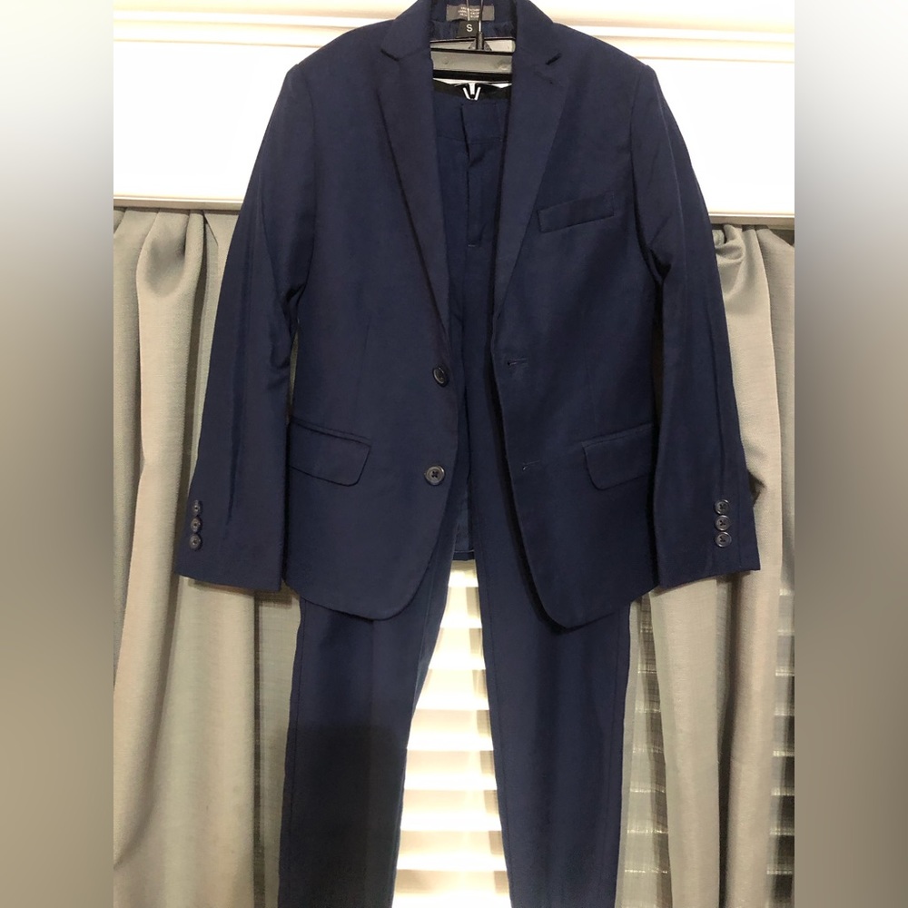 Van Heusen suit.
